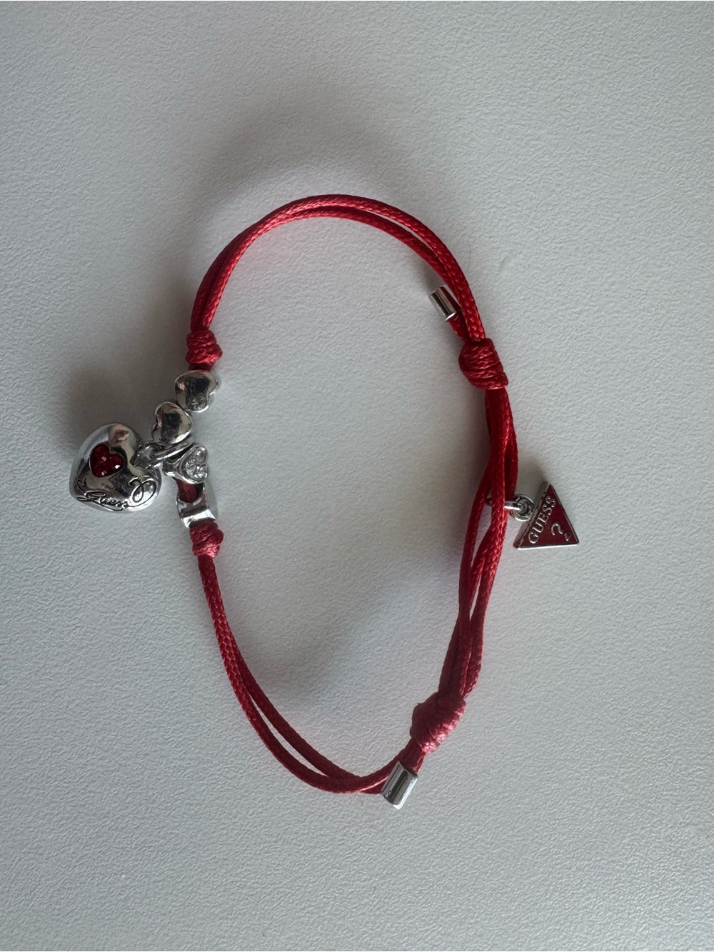 Guess Red Cord Bracelet with Silver Heart Charms